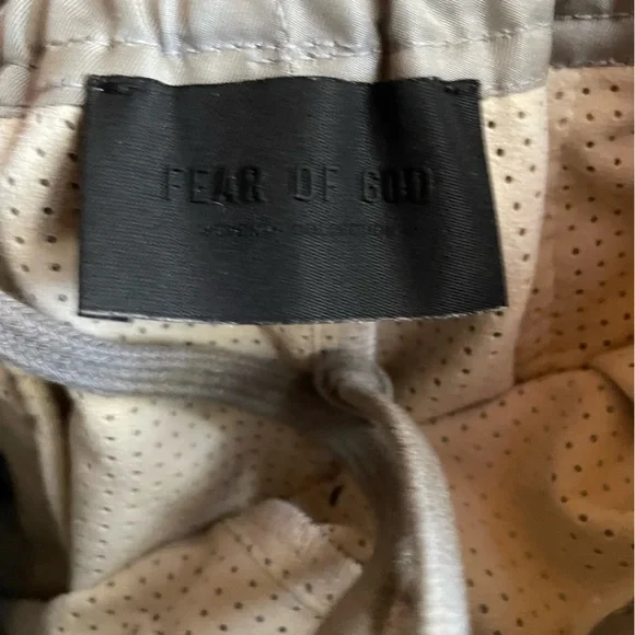 FEAR OF GOD ESSENTIALS Nylon Track Shorts in Silver - Picture 8 of 11